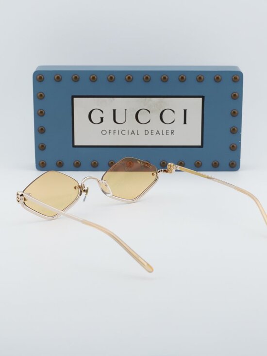 Gucci GG1604S 004 Geometric Sunglasses - Gold main image 9